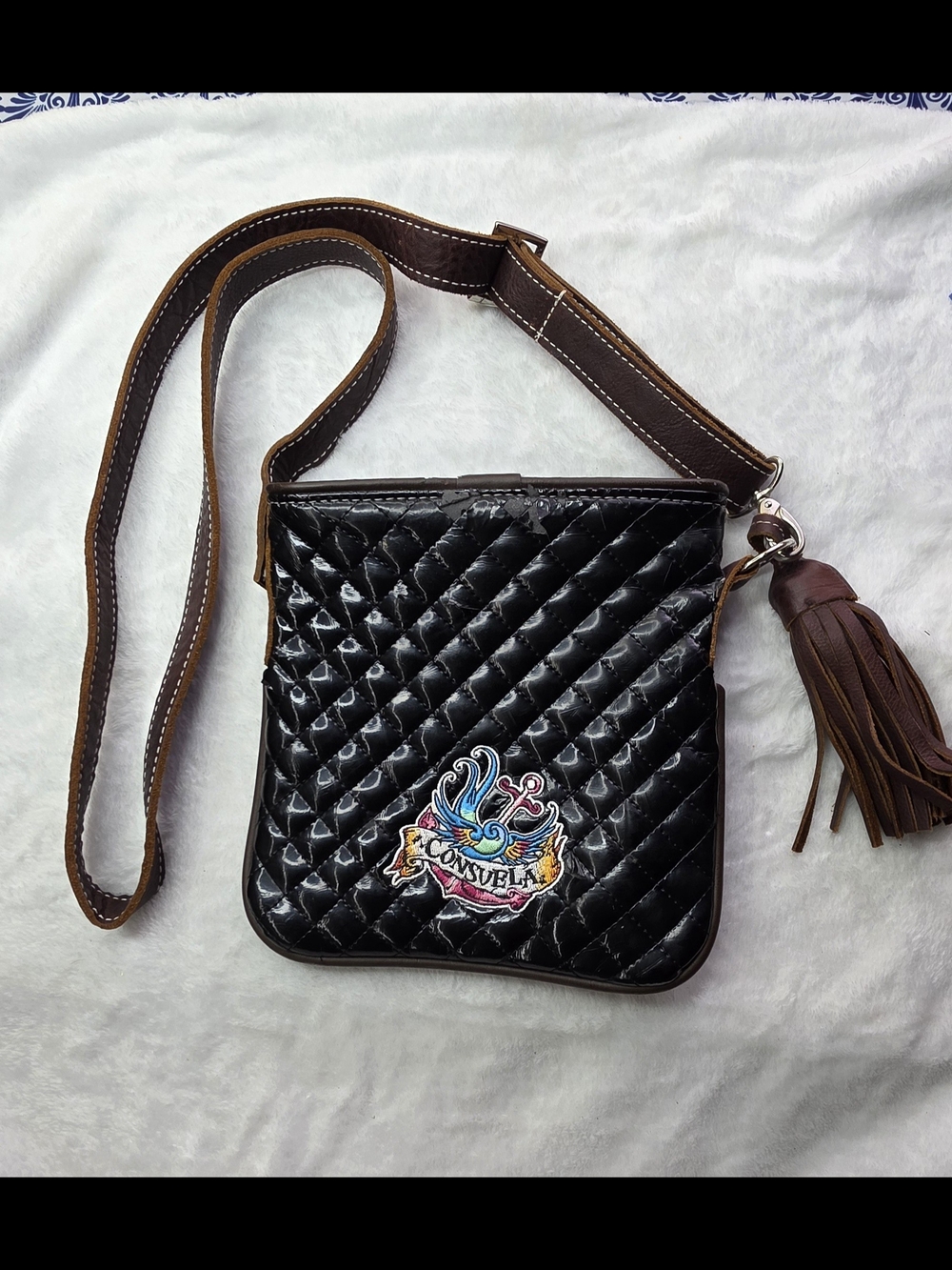 Consuela Black Quilted Crossbody Bag with Tassel